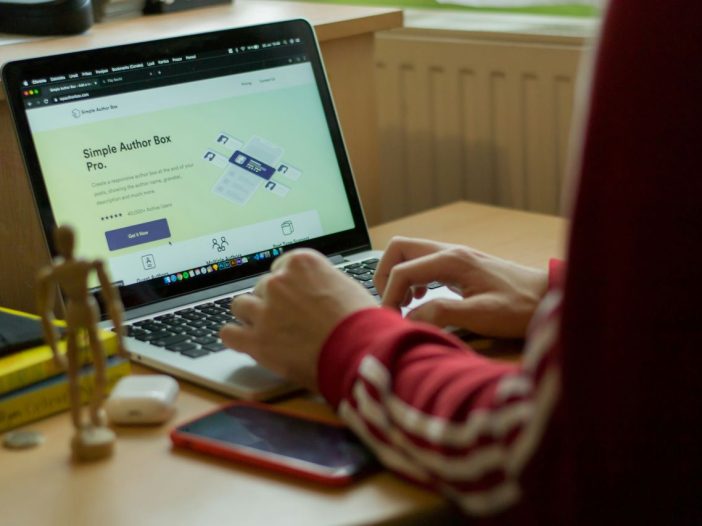 Laptop view of content credits and author boxes for writer websites.